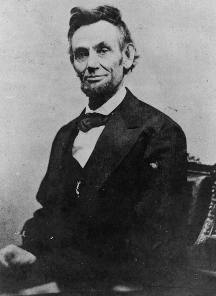 Abraham Lincoln half length seated2C April 102C 1865