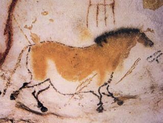 Image of a horse colored with yellow ochre from Lascaux cave.