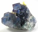 Transparent teal color fluorite with purple highlights