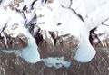 ذوبان الجليد في القطب الجنوبي لتظهر اليابسة بشكل واضح إلتقطت بواسطة القمر آستر
