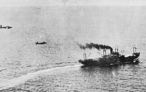 Two aircraft fly after a ship at very low altitude