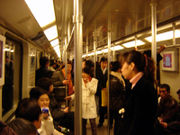 ملف:Shanghai Metro inside train.jpg