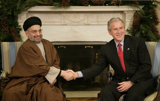 ملف:Al-Hakim meets G.W. Bush.jpg