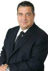 رجل الأعمال ياسين منصور