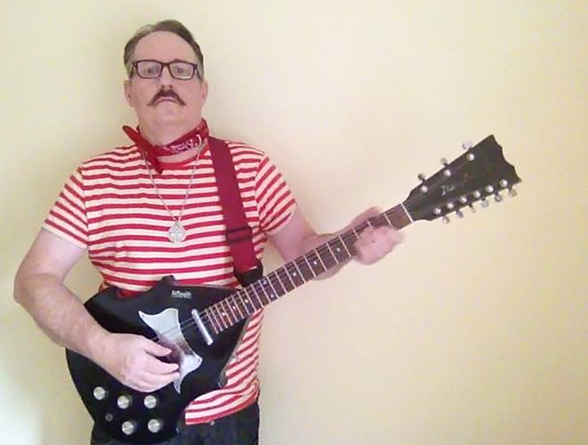 ملف:Composer and Members Guitarist JC Carroll.jpg