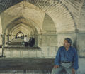 Pedestrians are offered tea in the resting areas under the historic Khaju Bridge.