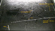 Image taken in the Pic du Midi at 2877 m in a Phywe PJ45 cloud chamber (size of surface is 45 × 45 cm). This rare picture shows in a single shot the 4 particles that are detectable in a cloud chamber : proton, electron, muon (probably) and alpha
