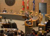 Political activist Hassan Dai addressing in Toronto with the Imperial flag.