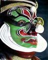 The decorated face of a Kathakali artist