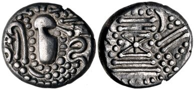 A Chaulukya-Paramara coin, c. 950-1050 CE. Stylized rendition of Chavda dynasty coins: Indo-Sassanian style bust right; pellets and ornaments around / Stylised fire altar; pellets around.[24]
