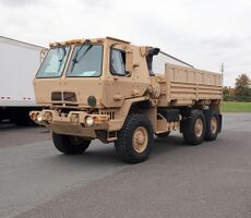An Oshkosh-produced M1083 A1P2 5-ton MTV in A-kit configuration