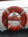 An orange lifebuoy on the U.S. Coast Guard ship Eagle.