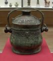 Bronze pot with lid and handle
