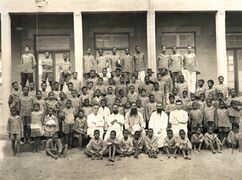 Teachers and students of the "School of Arts and Trades".