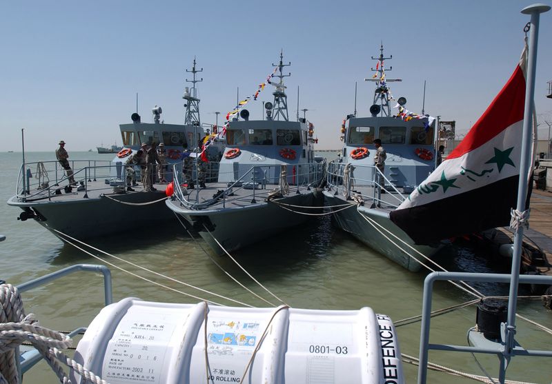 ملف:US Navy 040612-N-0401E-005 Iraqi Coastal Defense Force (ICDF) Patrol Crafts are prepared for the official opening of the ICDF base in Umm Qasr, Iraq.jpg