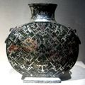 An Eastern Zhou Dynasty bronze and silver canteen