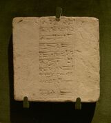 Brick from Girsu displaying cuneiform writing
