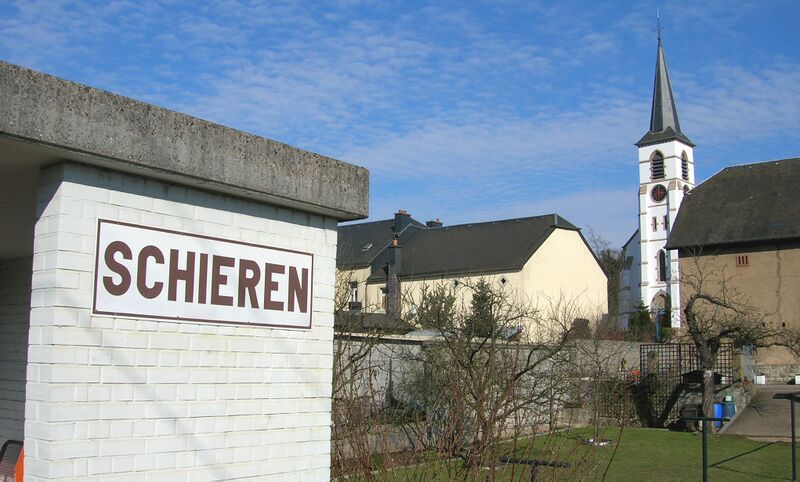 ملف:Schieren station + church.jpg