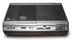 A Philips N1500 video cassette recorder, with wooden cabinet.