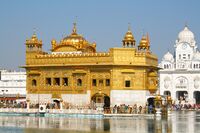 The Harmandir Sahib in Amritsar, India, known informally as the Golden Temple, is the holiest gurdwara of Sikhism, next to Akal Takht, a Sikh seat of power.