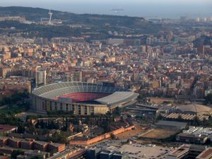 Barcelona stadium seen from above. It is a large and asymmetrically shaped dome.