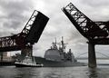USS Lake Erie, a Ticonderoga-class guided missile cruiser, passes under the Broadway Bridge on the Willamette River