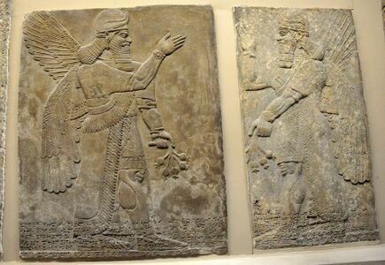 A pair of protective spirits, Apkallu, from Nimrud.