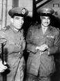 General Mohamed Neguib (L) and Colonel Gamal Abdel Nasser leave the last Revolutionary meeting late 23 February 1954. AFP/Getty Images