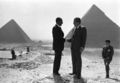 In this June 14, 1974 file photo Presidents Anwar Sadat and Richard Nixon shake hands for photographers as they pose in front of the pyramids at Giza, near Cairo. (AP Photo/Horst Faas)