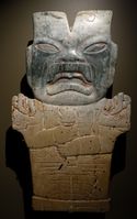 800-400 BC; serpentine, cinnabar; Dallas Museum of Art