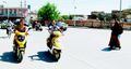 تدخر المرأة الأويغورية منذ صباها لاقتناء دراجة نارية، فيستخدمنها للذهاب إلى الأعمال والأسواق والمدارس.