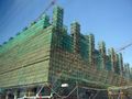 Beijing 2008's National Stadium under construction. The two Chinese characters say "bei" and "jing" ("north" "capital").
