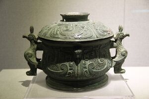 Bronze vessel decorated with bird motifs