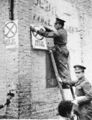 British Military Police affix "Out of bounds" posters to the walls in the Arab section of Ismalia, Egypt, March 20, 1952. The British Army is pulling out of the area after clearing it of terrorists and having many battles between Egyptian police and British troops. (AP Photo)