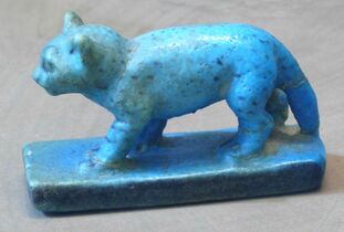 Blue Egyptian faience cat figurine dated to 1981−1802 BC