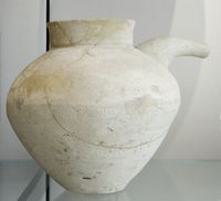 Uruk period vase. Terracotta, ca. 3500–2900 BC. From Telloh, ancient city of Girsu. Louvre Museum.