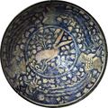 14th century ceramic bowl with hare and flying Simurghs from Sultanabad (today Arak)