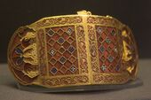 Shoulder-clasps from Sutton Hoo; early 7th century; gold, glass & garnet; length: 12.7 cm; British Museum (London)