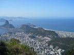 Partial view of Rio de Janeiro from atop Corcovado — left: Sugarloaf Mountain (Pão de Açúcar); center: Copacabana beach